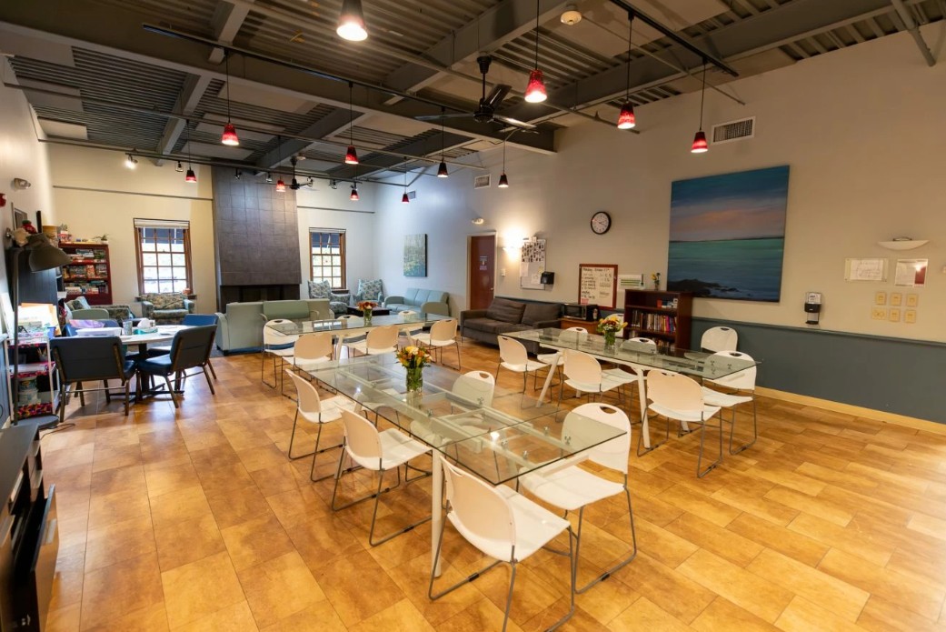 Large dining area with tables, chairs, and lounge seating