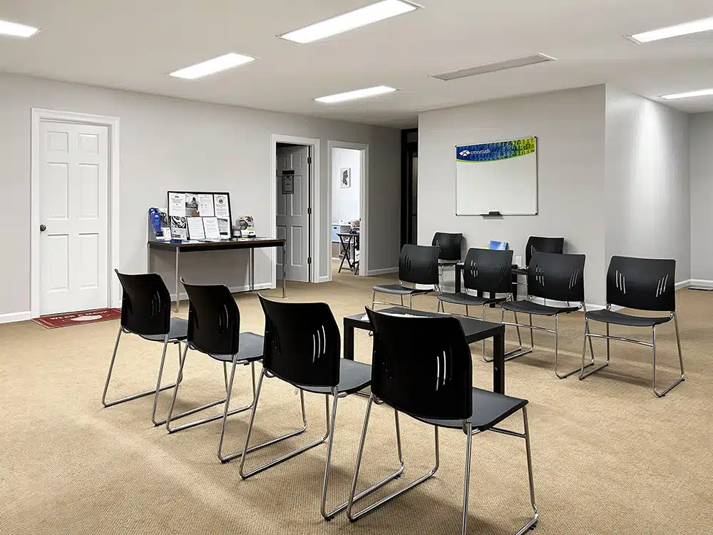 Group meeting room with chairs and whiteboard in rehab center