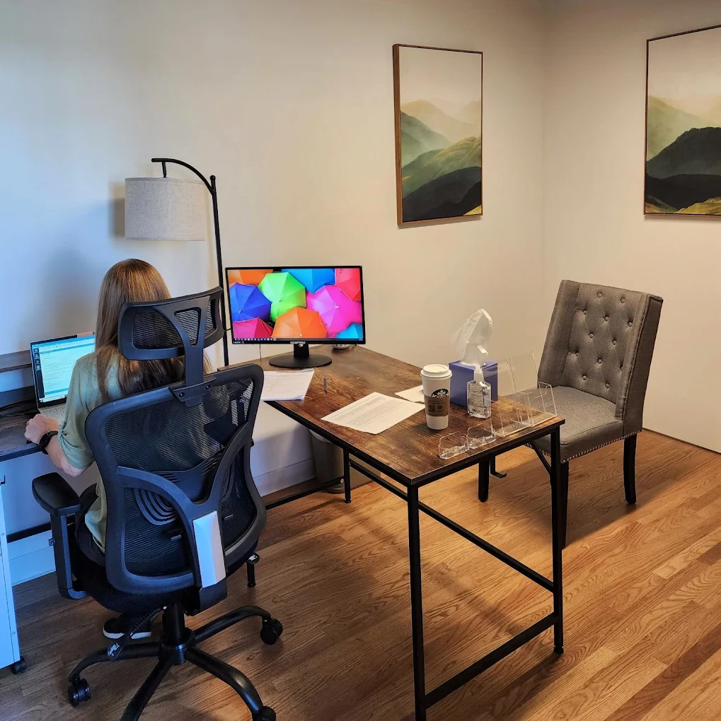 Private consultation room with desk, computer, and visitor chair at Master Center Harrisonburg