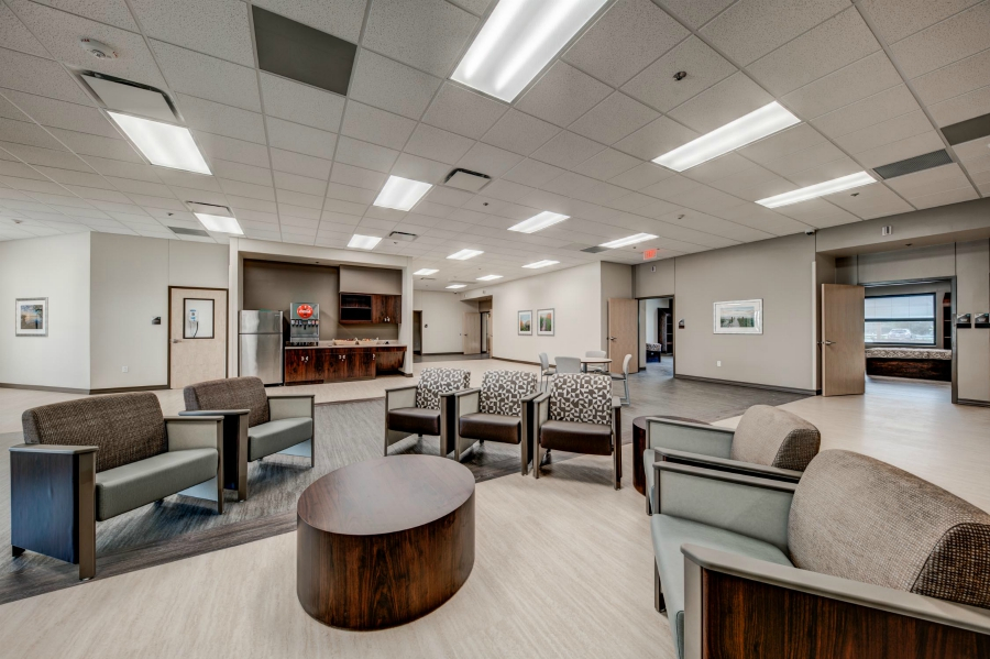 Chairs and tables in a shared open lounge space
