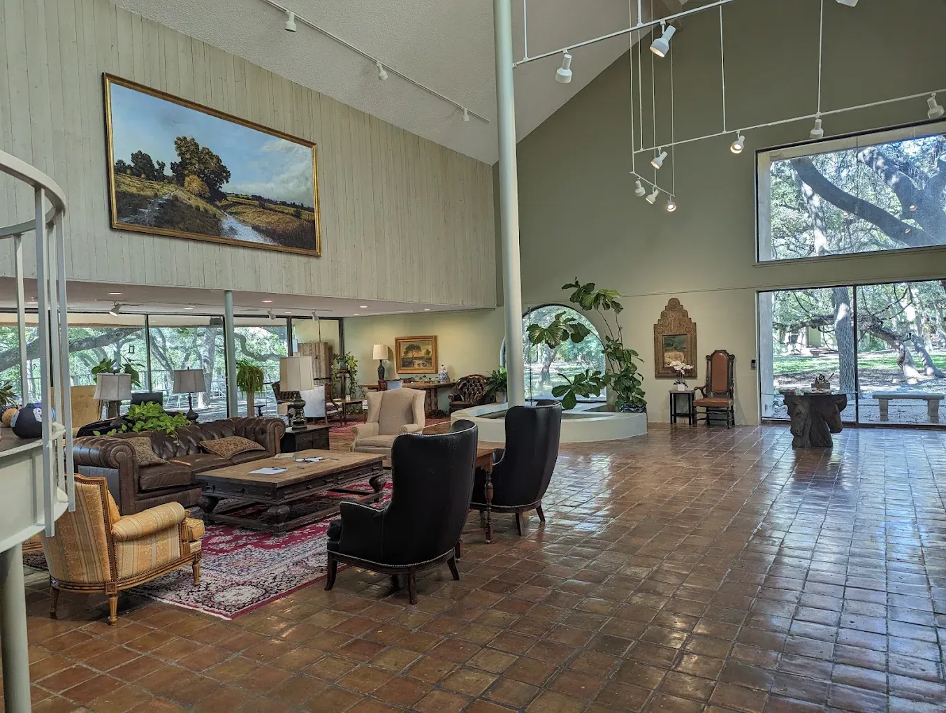 Spacious lobby with seating and large windows at Blue Heron Recovery