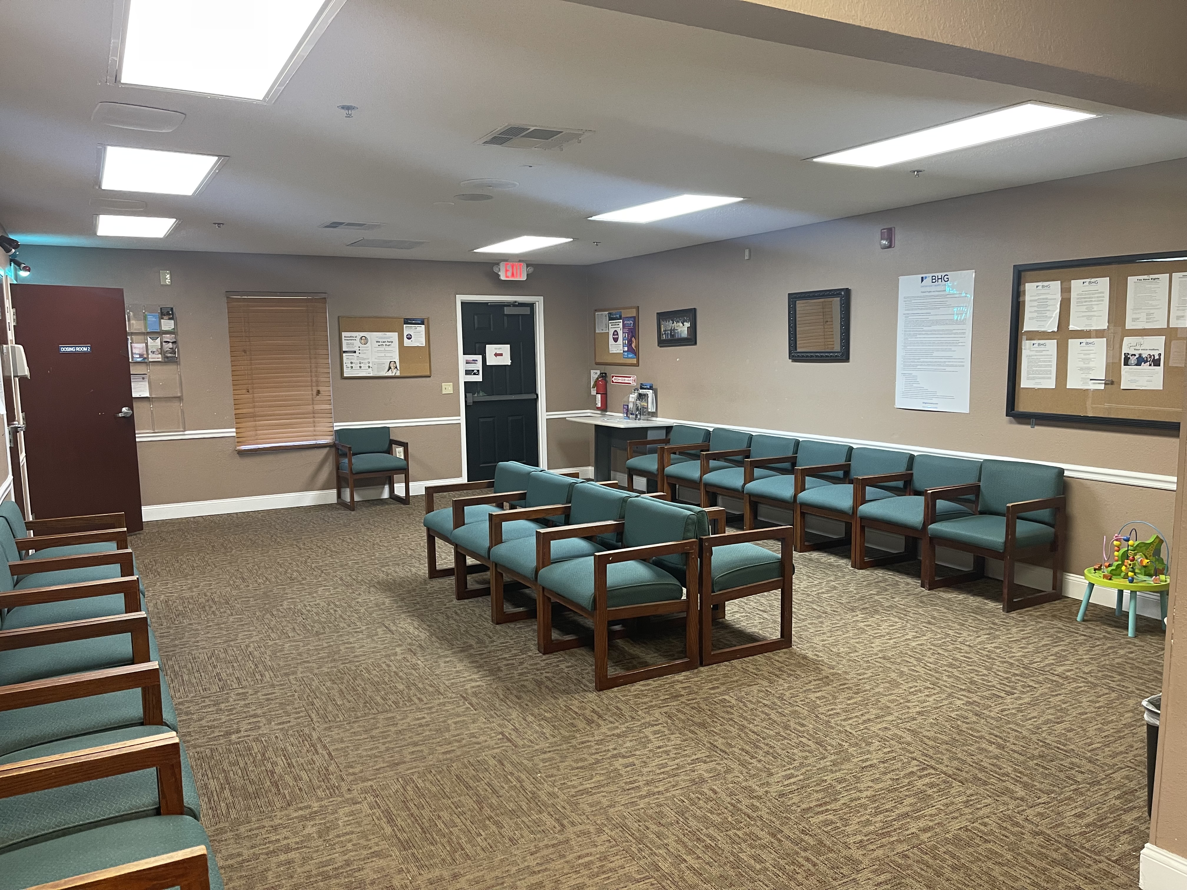 Lobby waiting area with seating and patient information