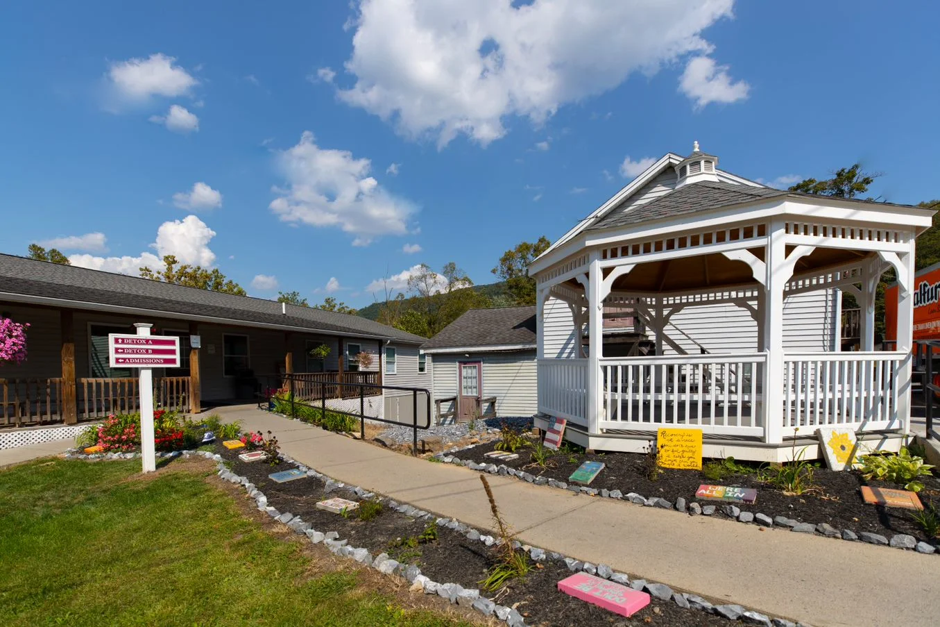 Rehab facility courtyard with gazebo and garden walkway