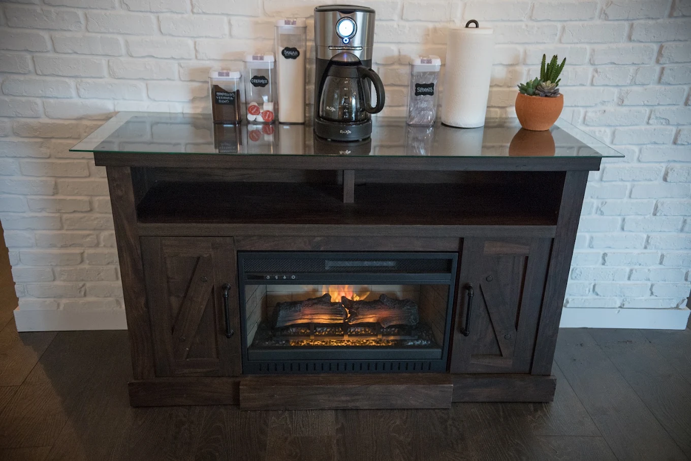 Coffee station above an electric fireplace
