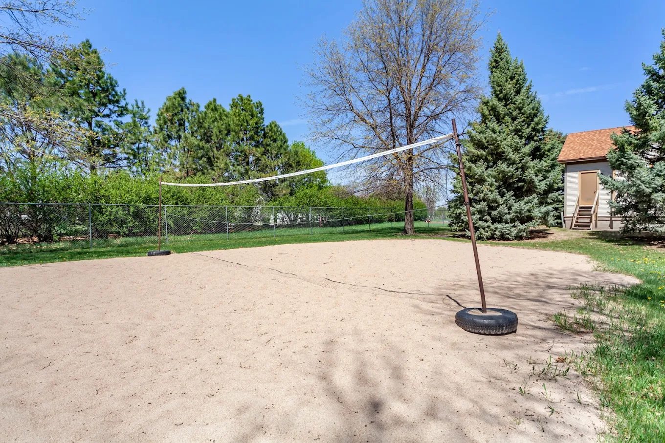 Outdoor sand volleyball court for recreation