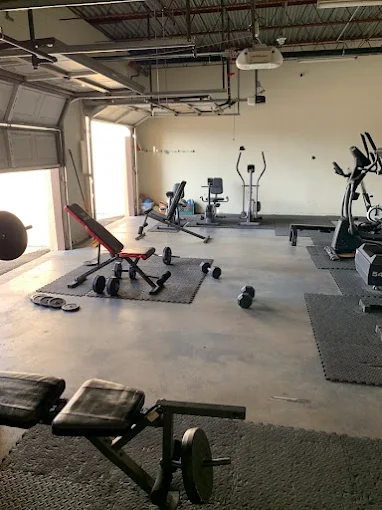 Fitness center with weights and cardio equipment