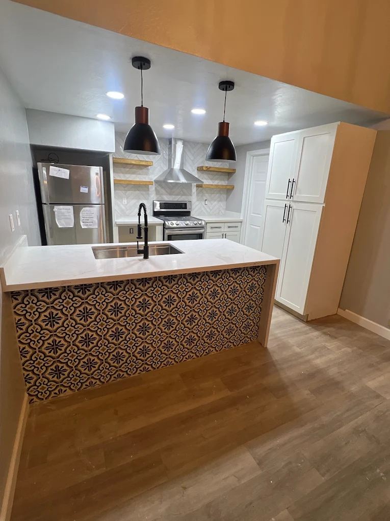Rehab facility kitchen with island and modern appliances