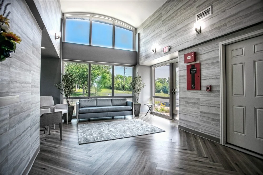 Reception lobby with seating and natural light