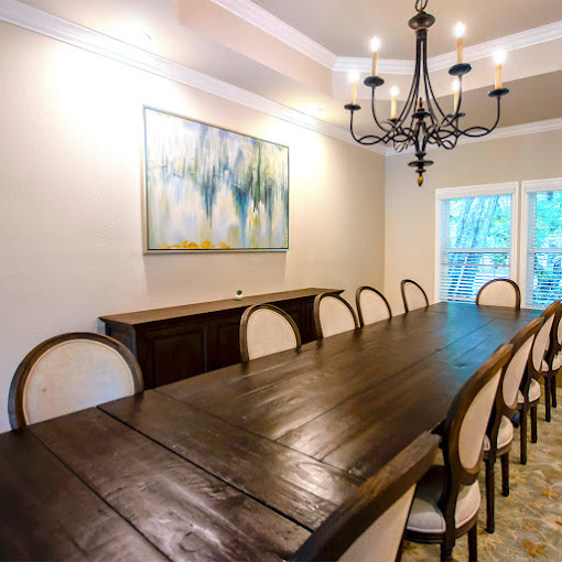 Dining room with a table and chairs.
