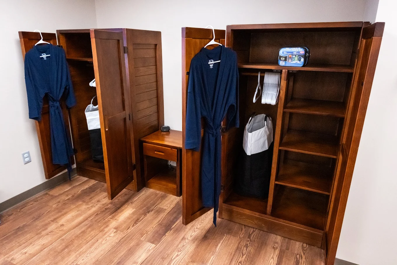 Secure client storage cabinets with hanging space
