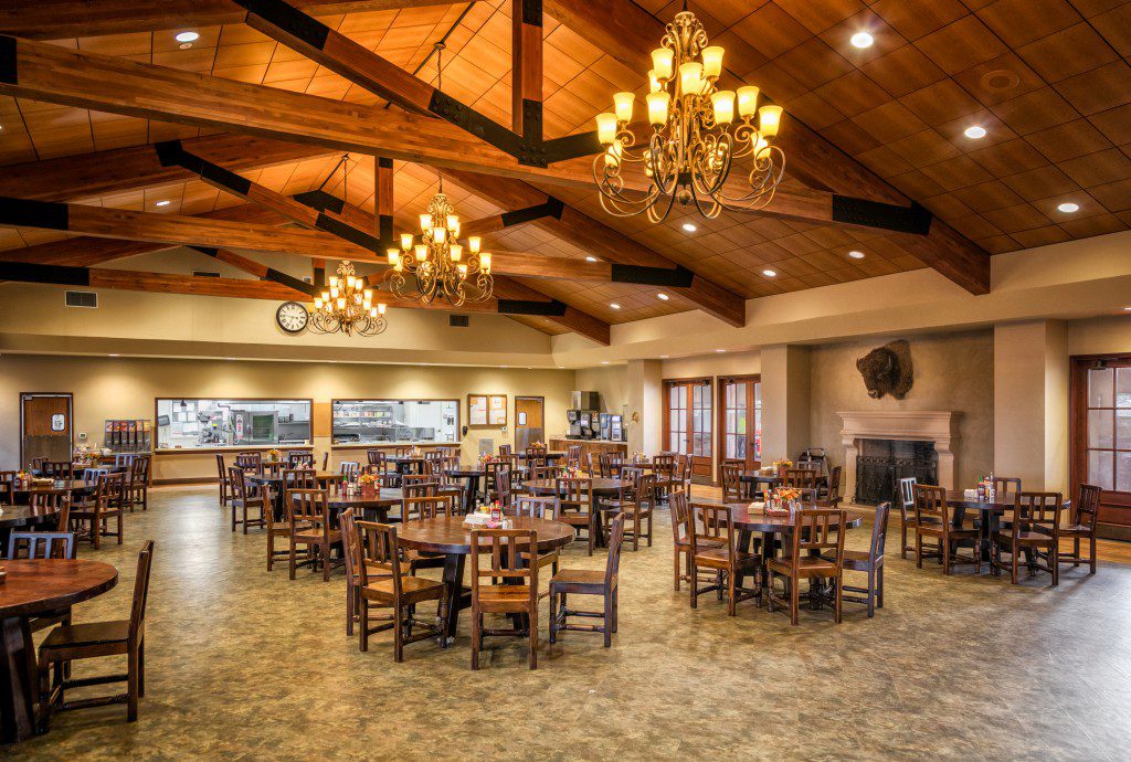 Spacious dining hall with fireplace and seating