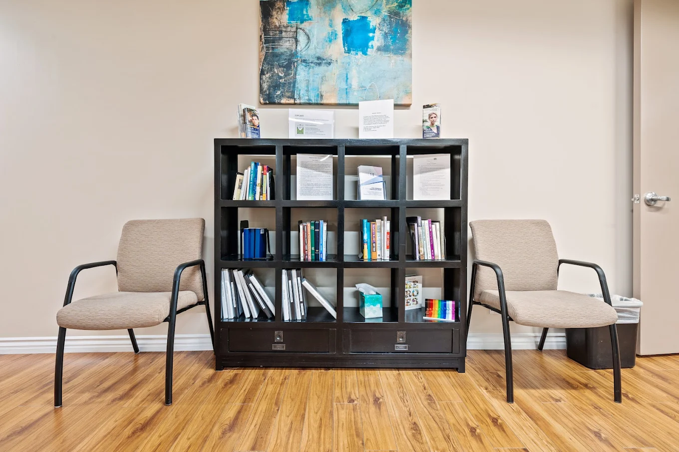 Bookshelf with recovery resources and reading materials