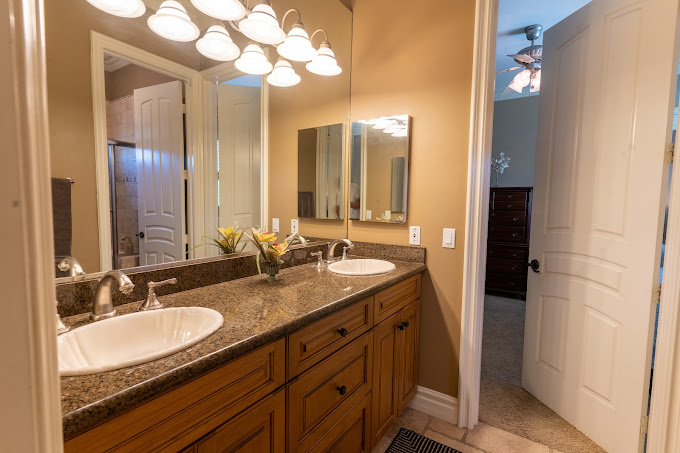 Double-sink bathroom with granite countertop