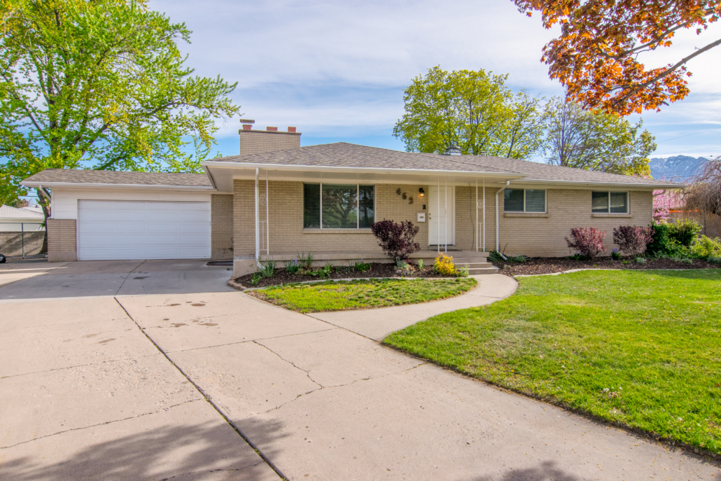 Exterior view of sober living home with front lawn