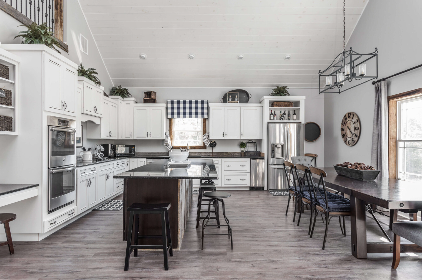 Kitchen and dining area with large table and island