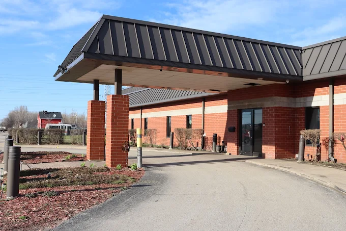 Brick building with drive-up covered entrance