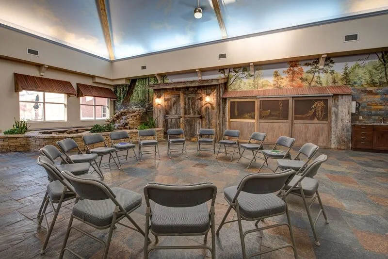 Group room with chairs arranged in a large circle