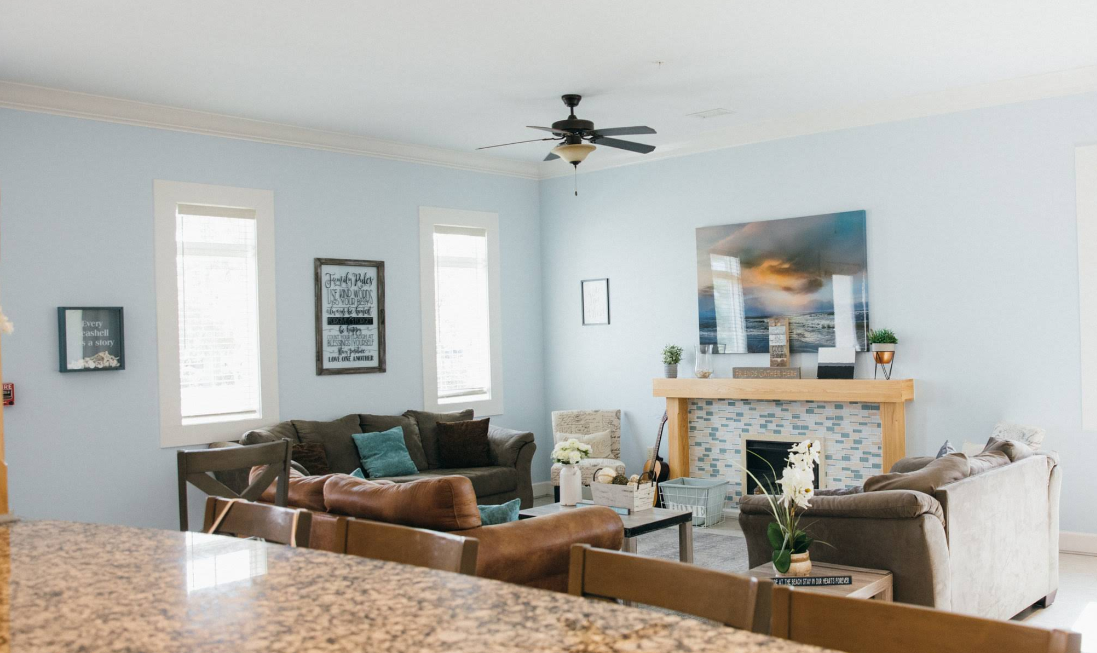 Comfortable group living room with sofas and fireplace