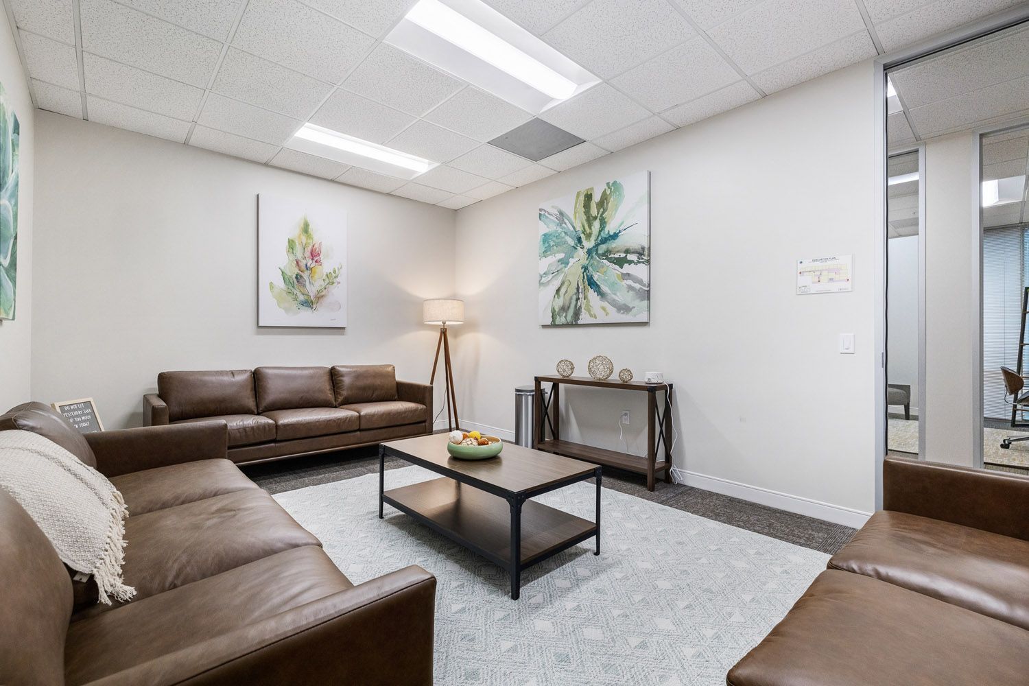 Lounge with leather sofas and modern decor