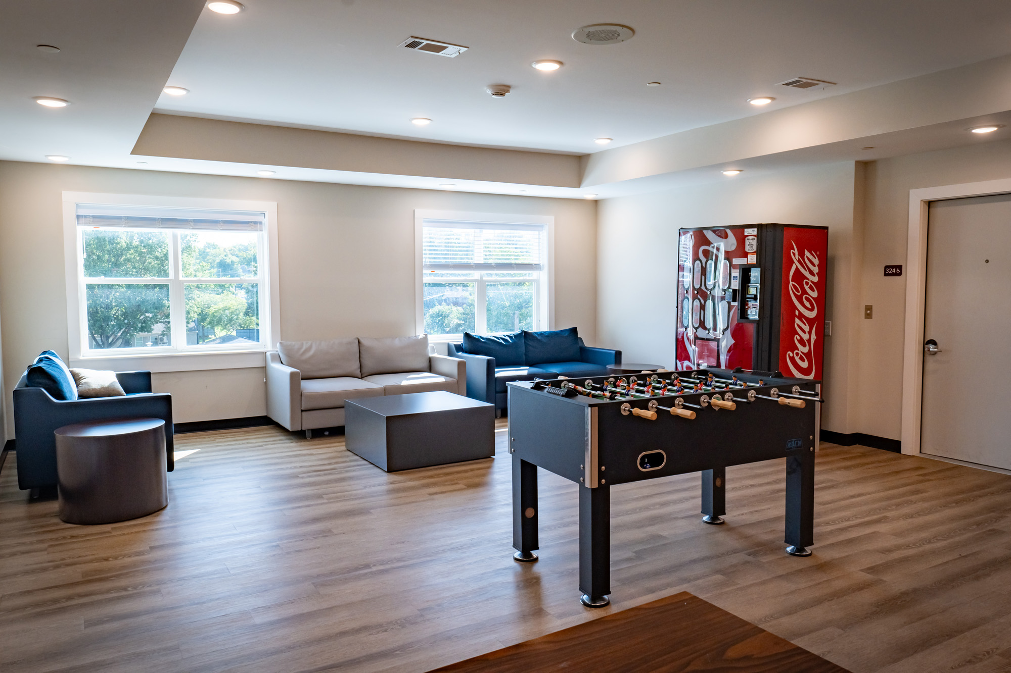 Lounge with sofas, foosball table, and vending machine