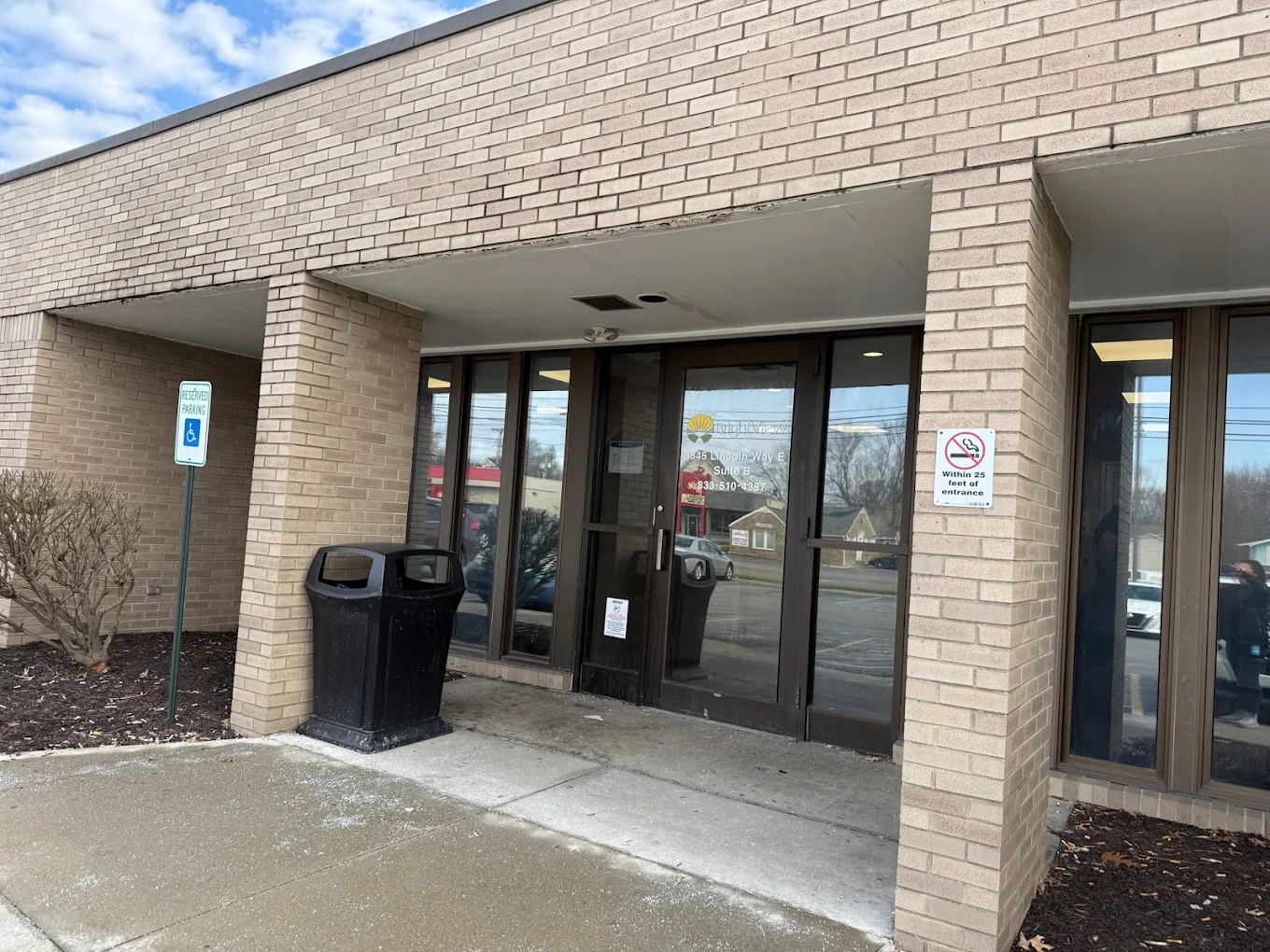 Covered glass entrance to BrightView Massillon