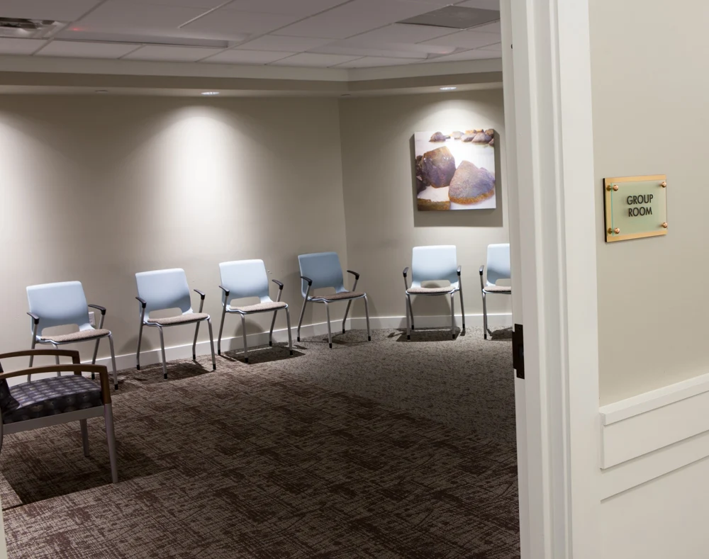 Circular setup of chairs in therapy group room