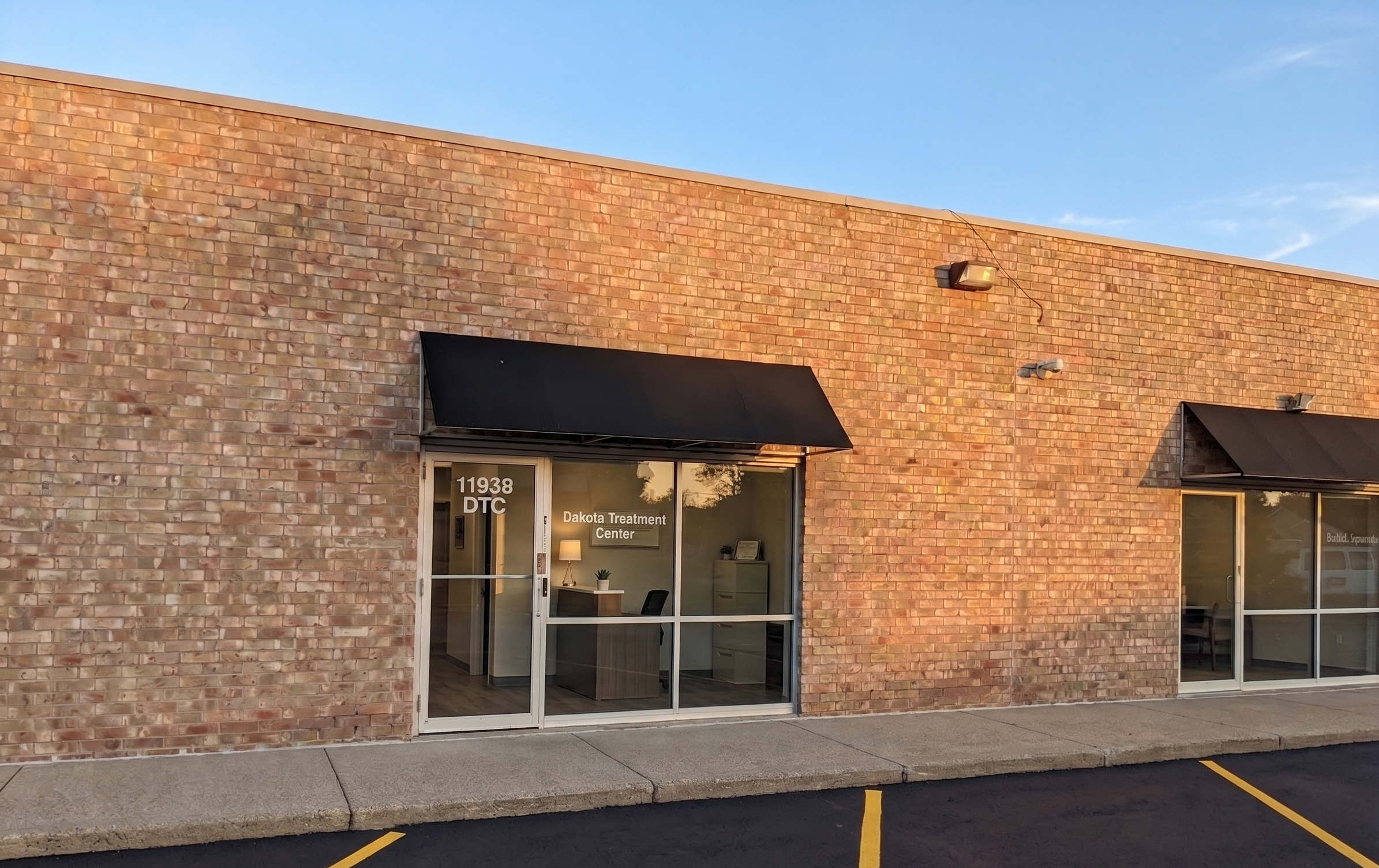 Dakota Treatment Center entrance with brick exterior and awning