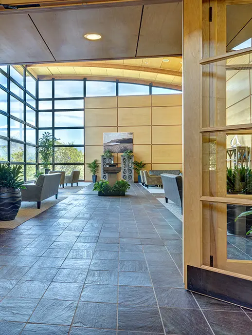 Modern living area with couches and open layout.