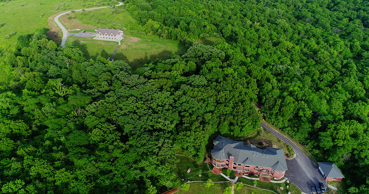 Aerial view of treatment buildings surrounded by forest