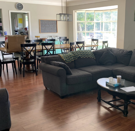 Cozy lounge with sectional sofa and dining space