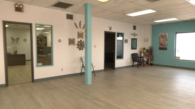 Open common area with doors leading to therapy rooms
