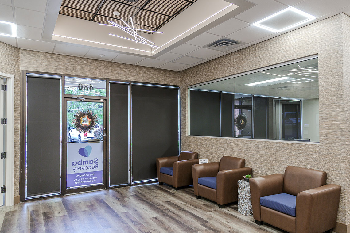 Lobby with seating and glass entrance doors