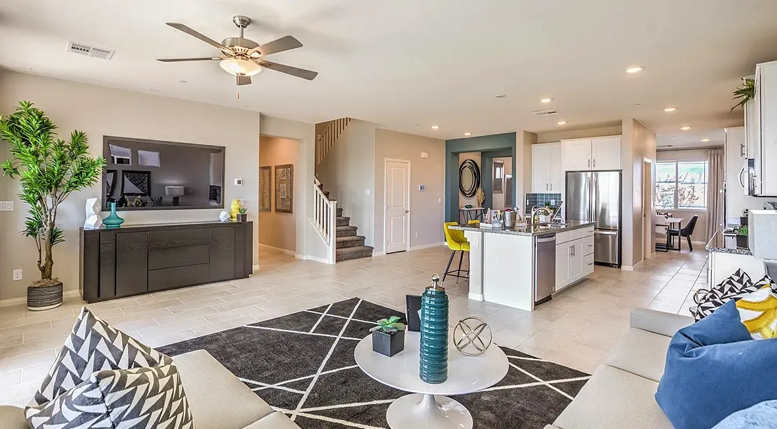 Spacious living room with kitchen and dining area in view