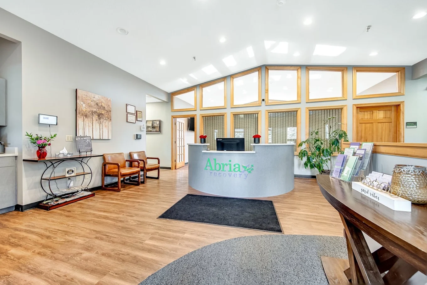 Modern reception desk with wood trim and welcoming atmosphere