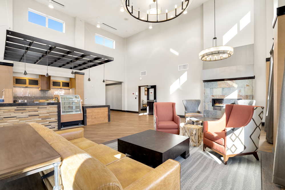 Comfortable lobby seating with fireplace and lounge area