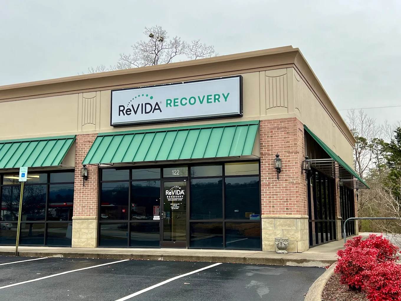 Clinic storefront with parking lot and entrance
