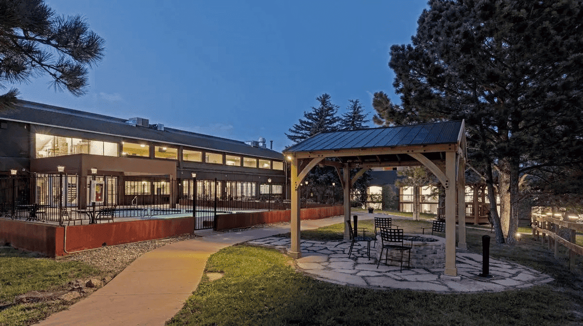 Outdoor gazebo, fire pit, and seating.