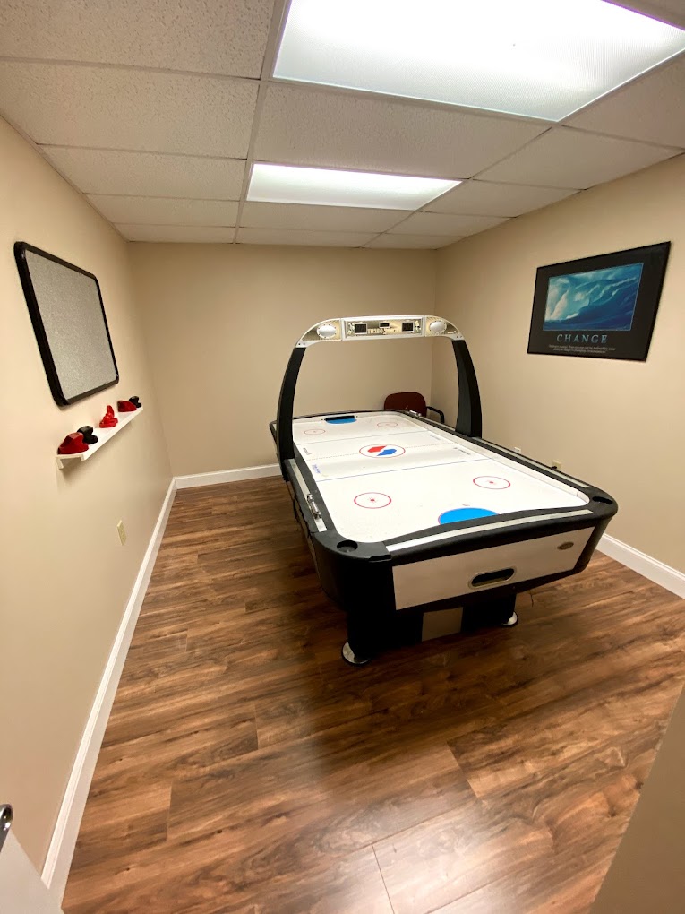 Recreational room with game table.