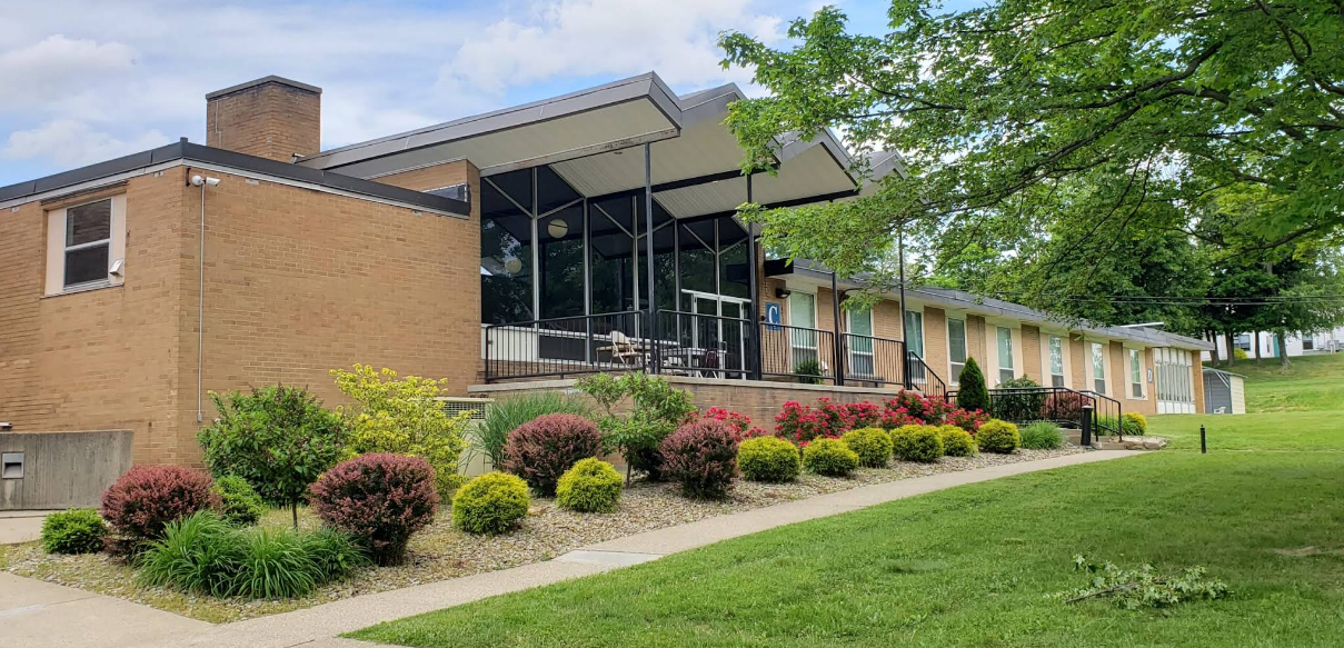 Exterior view of the Donofrio Center with landscaped grounds