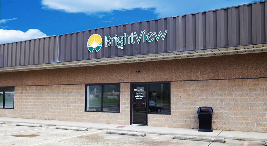 Exterior of BrightView Health Portsmouth with facility signage, front entrance, windows, and parking spaces