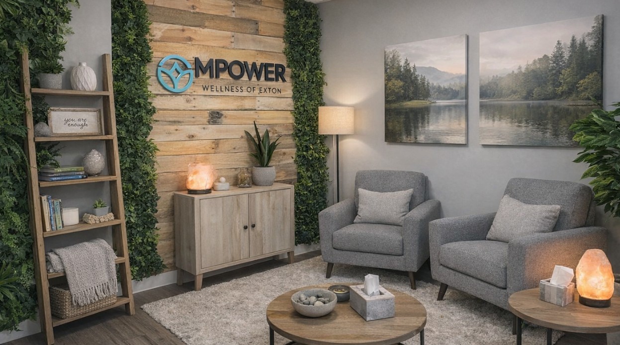 Cozy waiting room with chairs and wood accent wall