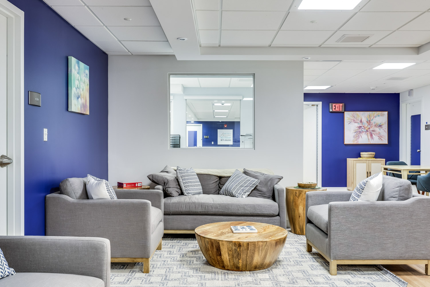 Teen lounge with couches and warm lighting
