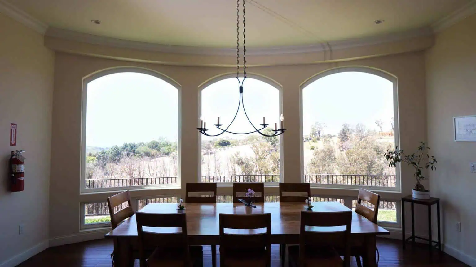 Dining room with large windows overlooking the hills