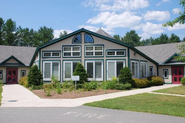 Main Valley Vista building with lawn and landscaped entrance