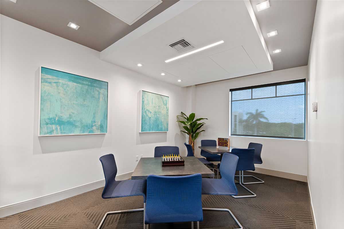 Recreation room with tables and seating for activities