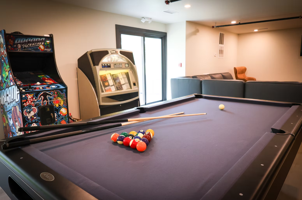 Pool table with arcade machine and jukebox
