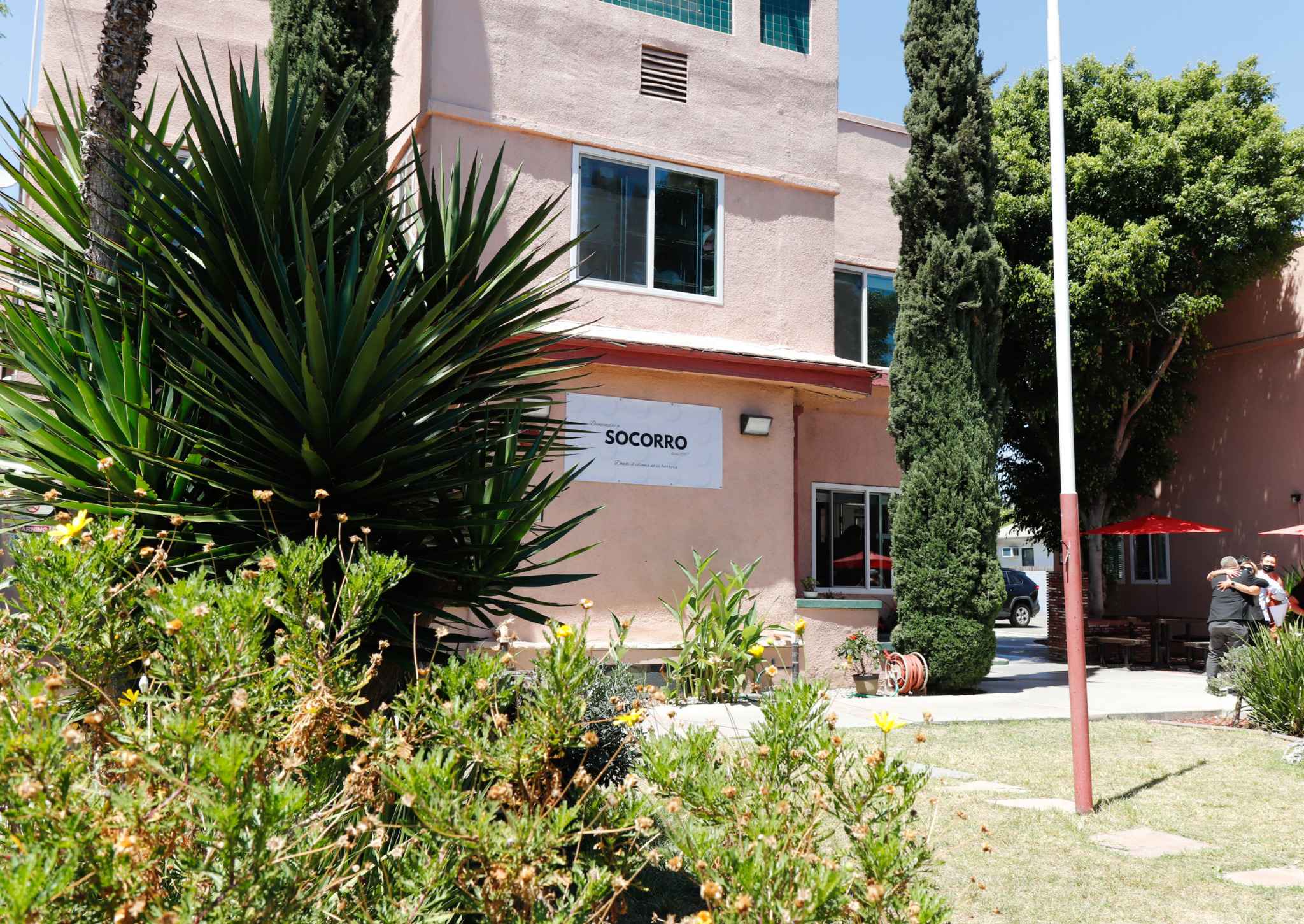 Exterior of Socorro rehab facility with trees and landscaping