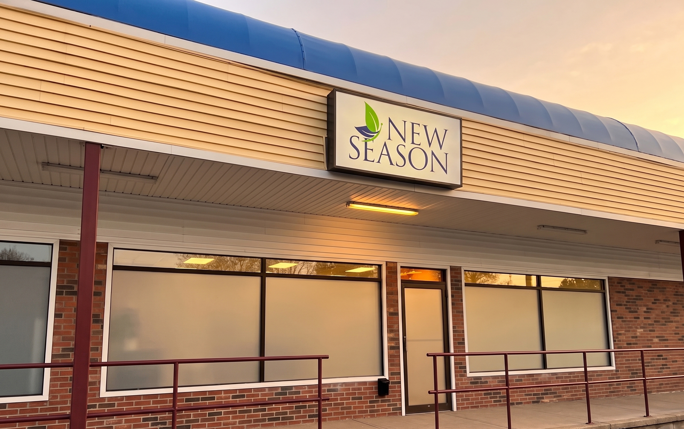 New Season facility exterior with covered walkway and entrance