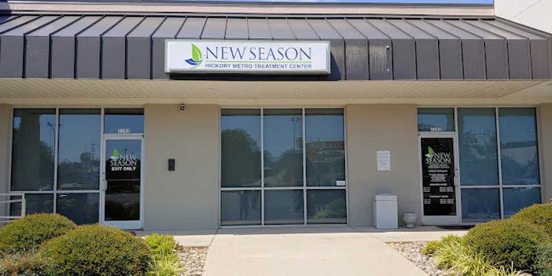 New Season Hickory Metro Treatment Center's entrance with clean, modern architecture, large windows, and well-maintained landscaping.