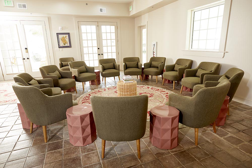 Group therapy room with chairs arranged in a circle